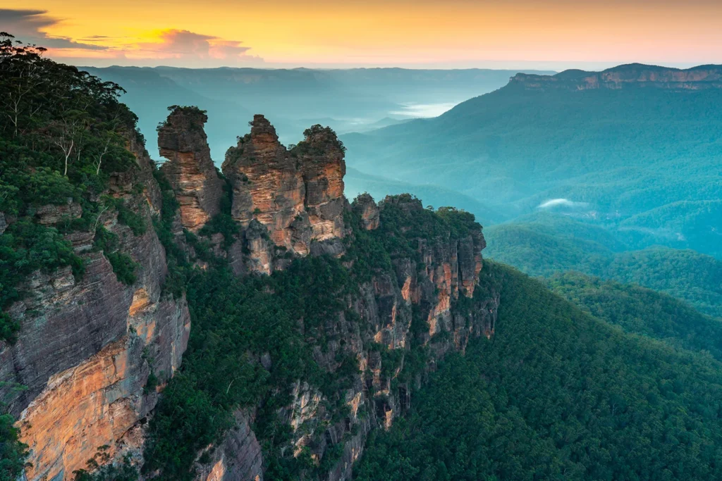 Regarding the most famous spot in the Blue Mountains, local legend speaks of three sisters from the Katoomba tribe turned into stone.