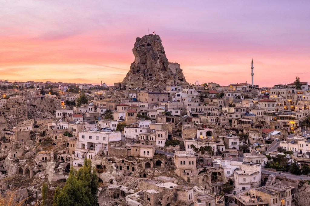 The largest and tallest rock formation in Cappadocia resembles a massive castle overlooking the city.