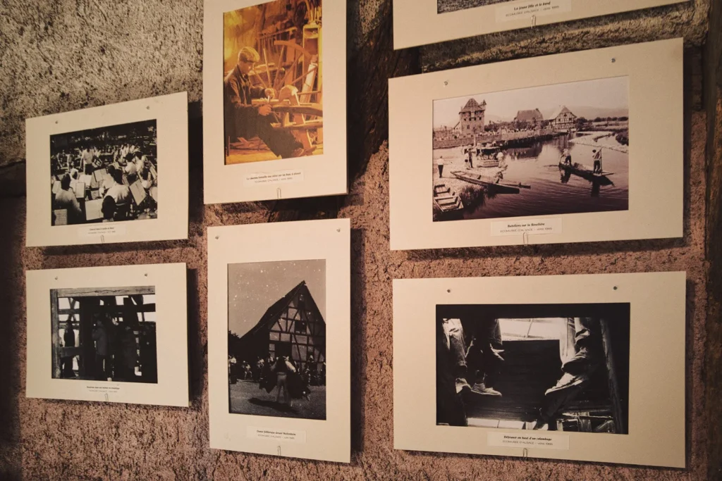 Historical photos of the first houses built on the grounds of the Alsace Ecomuseum.